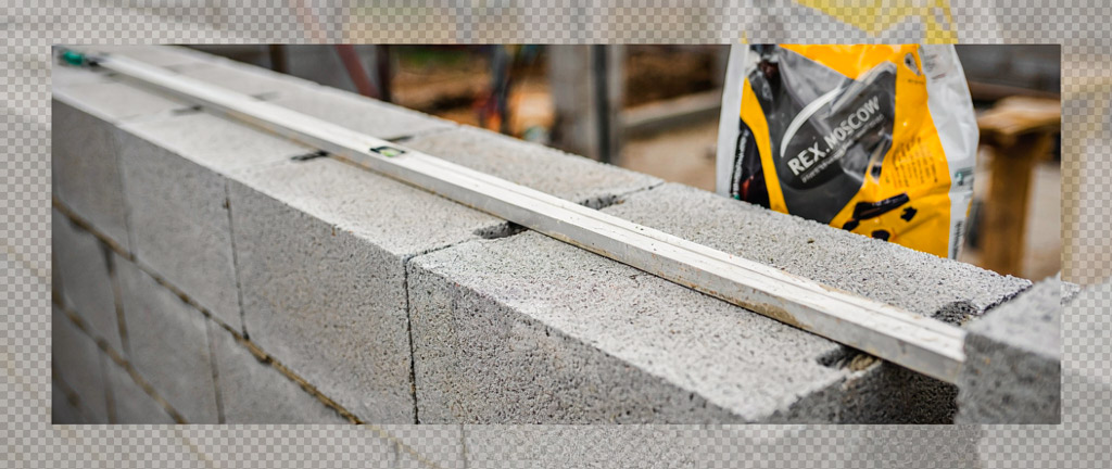 Клей для пеноблоков и газобетона: критерии выбора и технология кладки